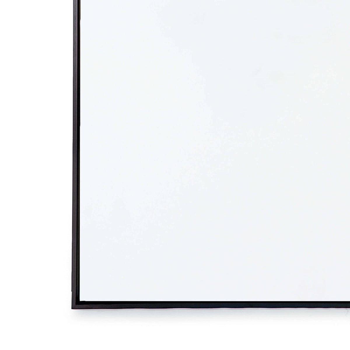 Sleek 44x28" rectangular hanging mirror with a thin black steel frame, perfect for a vanity or entryway.
