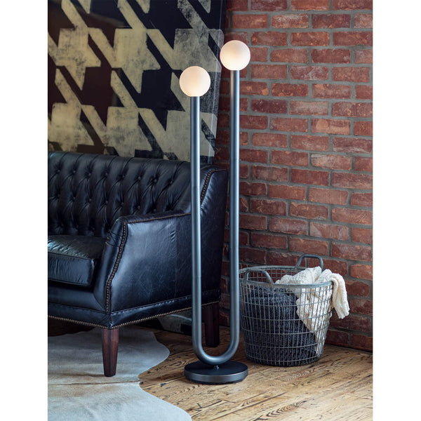 Happy Floor Lamp with oil rubbed bronze U-shaped frame and two matte white glass globes.