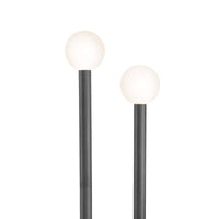 Happy Floor Lamp with oil rubbed bronze metal tube frame and two matte white glass globes.