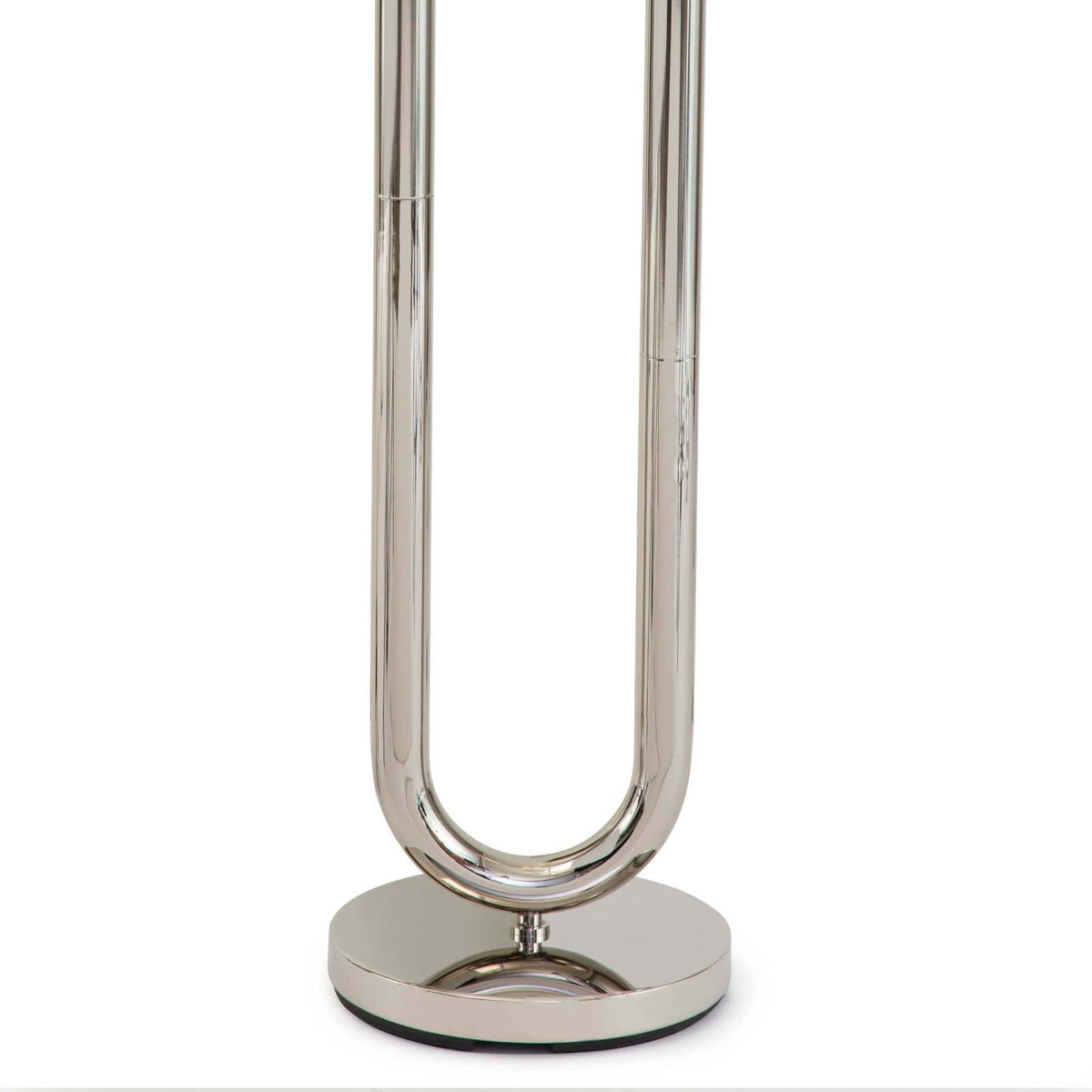 Happy Floor Lamp with polished nickel U-shaped metal frame and round base.
