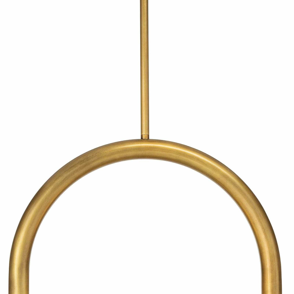 Happy Pendant Small Natural Brass, a modern arched light fixture with a matte white glass globe.