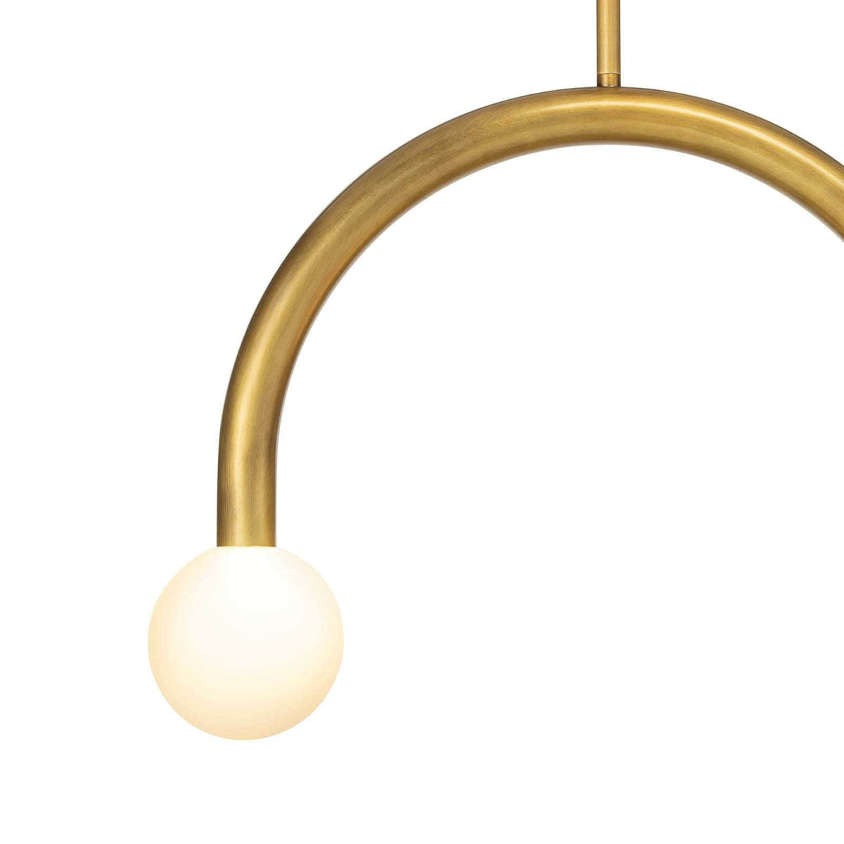 Happy Pendant Small Natural Brass light with a curved brass frame and a matte white glass globe.