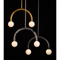 Three Happy Pendants: polished nickel, brass, and dark metal, each with two matte white glass globes.