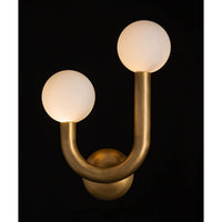 Happy Sconce Left Side in natural brass with two matte white glass globes.