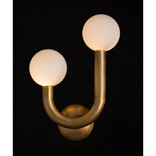 Happy Sconce Left Side in natural brass with two matte white glass globes.