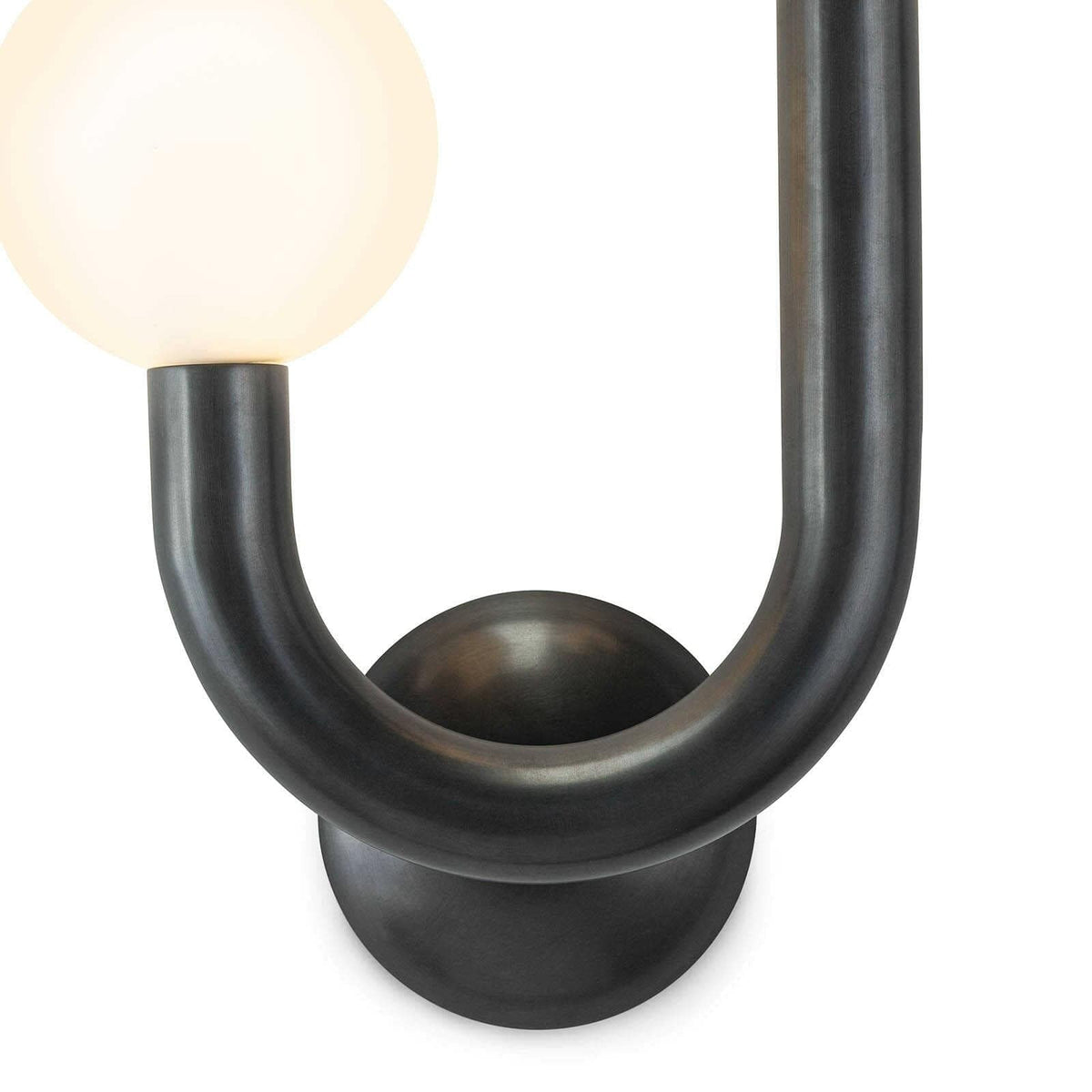Happy Sconce Left Side in oil rubbed bronze with a matte white glass globe.