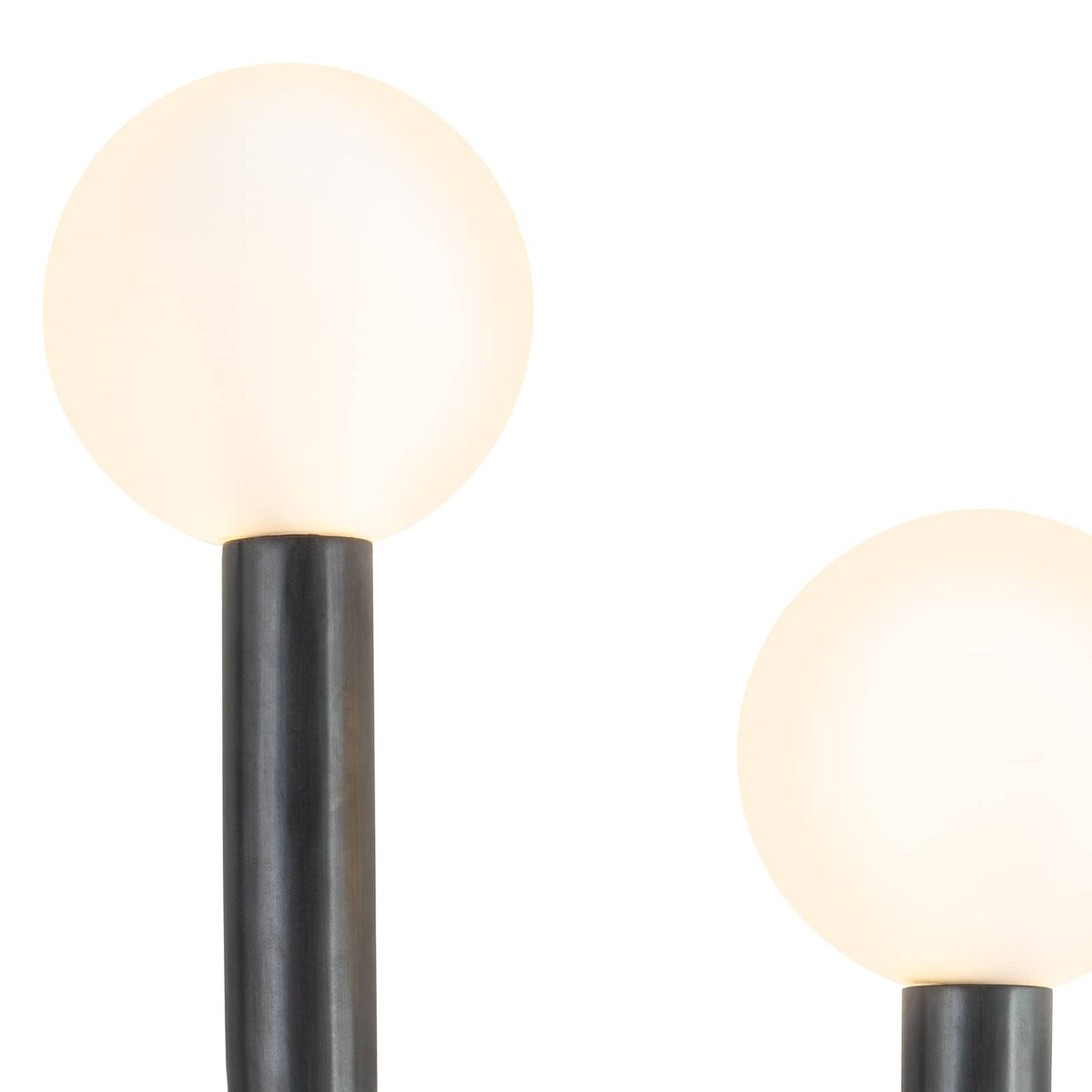 Happy Sconce Right Side in oil rubbed bronze with two matte white glass globes.