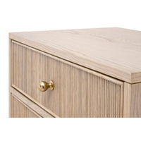 Hargrove Natural Oak 2-Drawer Nightstand with reeded drawer fronts and a brass knob.
