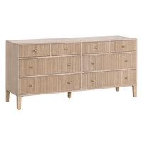 Hargrove natural oak 8-drawer dresser with reeded drawer fronts and gold knobs.