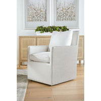 Harmony French Linen Armchair with two-tone fabric, reversible cushion, and casters.