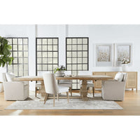 Harmony French Linen Armchair with two-tone fabric, casters, and removable cushion in a dining room setting.