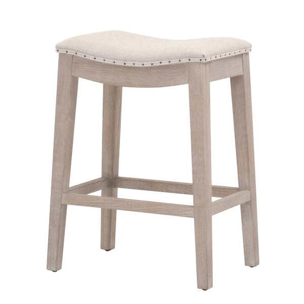Harper Bisque French Linen Counter Stool with light ash wood legs and saddle seat with nailhead trim.
