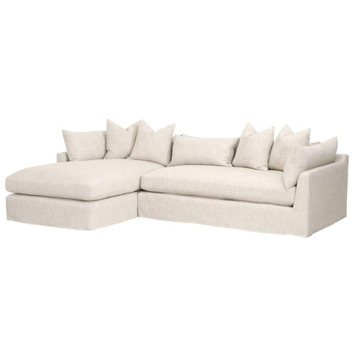 Hayberry slipcover sectional with a left-arm facing chaise, upholstered in a light linen-polyester blend fabric.