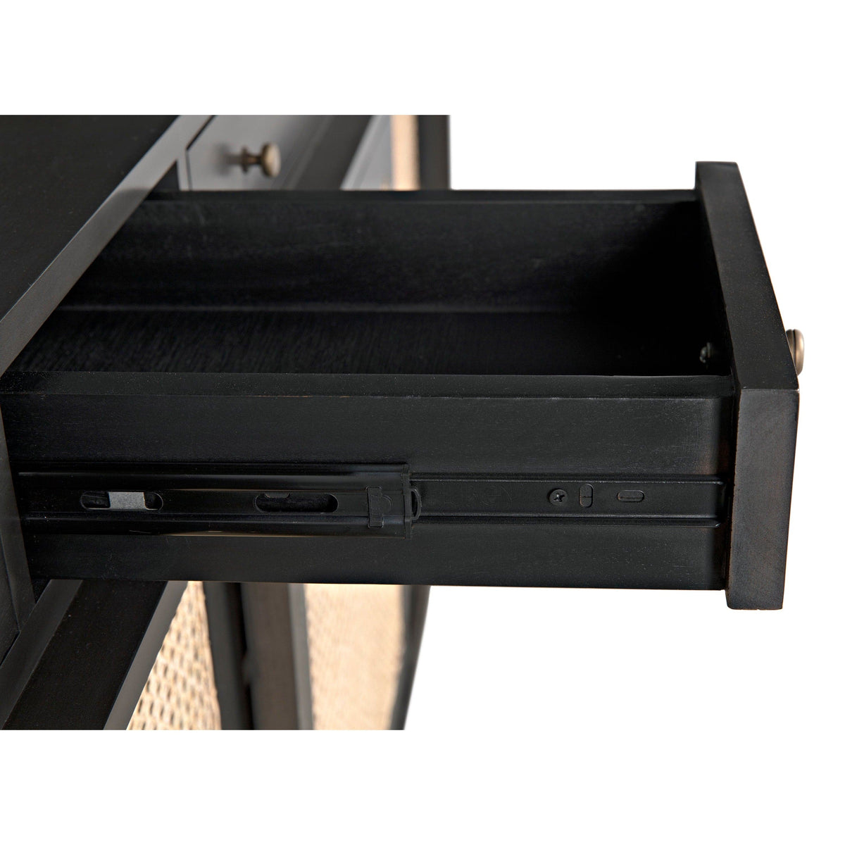 Close-up of a dark mahogany Hermosa sideboard drawer, open to reveal black interior and metal glides.