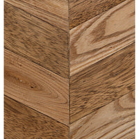 Close-up of a herringbone sideboard with contrasting washed and dark walnut wood strips.