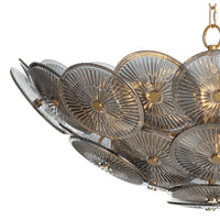 Holly Disc Chandelier with overlapping clear smoke glass discs, natural brass finials, and a brass chain.