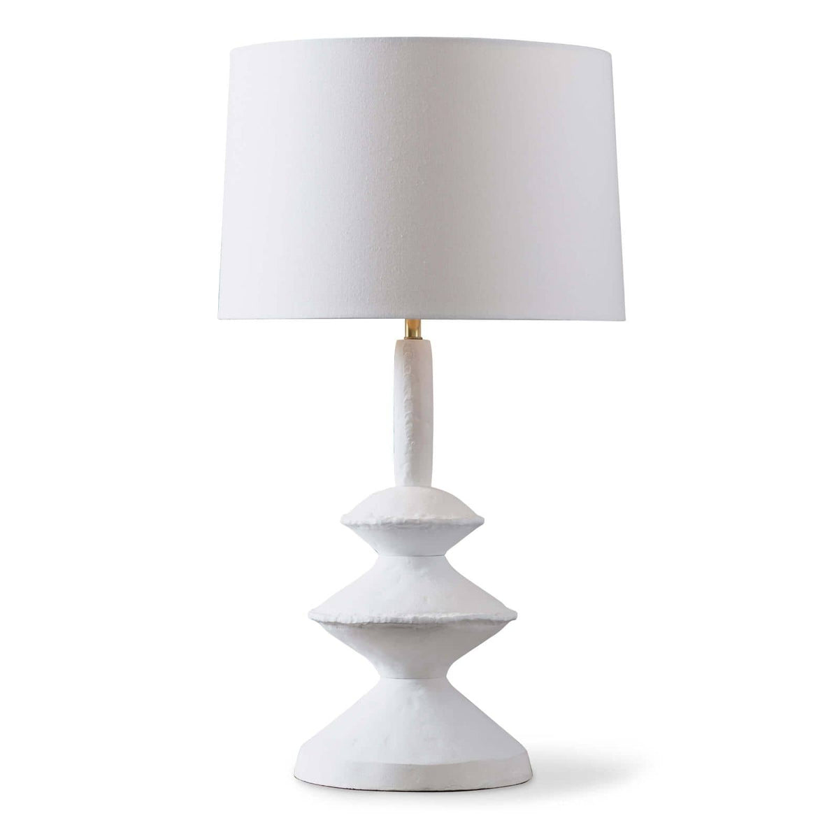 Matte white Hope Table Lamp with a unique, sculpted base and a white linen shade.