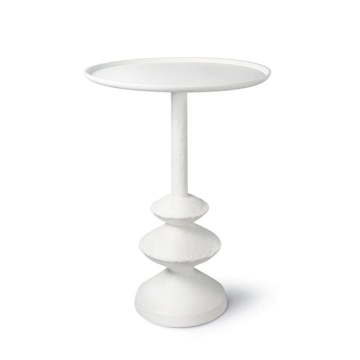 Matte white accent table with complex curves and a unique paper mache-inspired design.