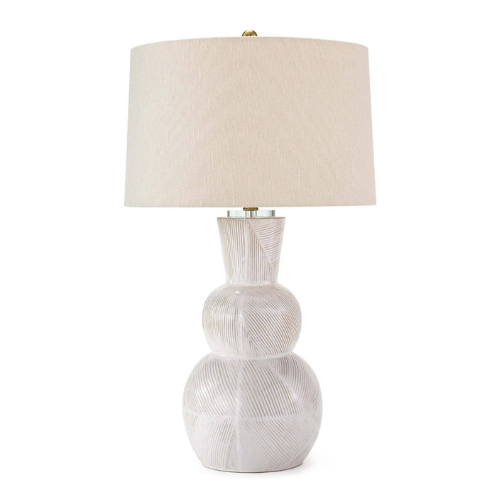 Hugo 31" ceramic table lamp with a textured white earthenware base and a natural linen shade.