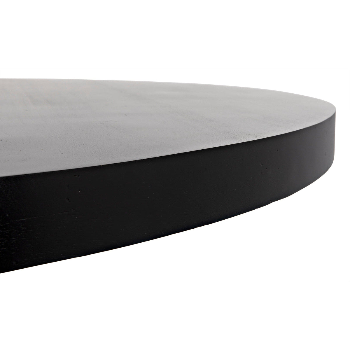 Hugo round mahogany dining table with hand-rubbed black finish and thick edge.