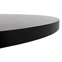Hugo round mahogany dining table with hand-rubbed black finish and thick edge.