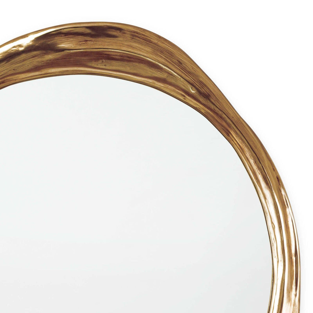 Ibiza Mirror with an organic, undulating antique gold frame and a classic finish.