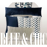 Luxury Impasto Blue Multi Throw Pillow, 24x24, with textured blue squares on white, surrounded by coordinating blue and gray pillows.