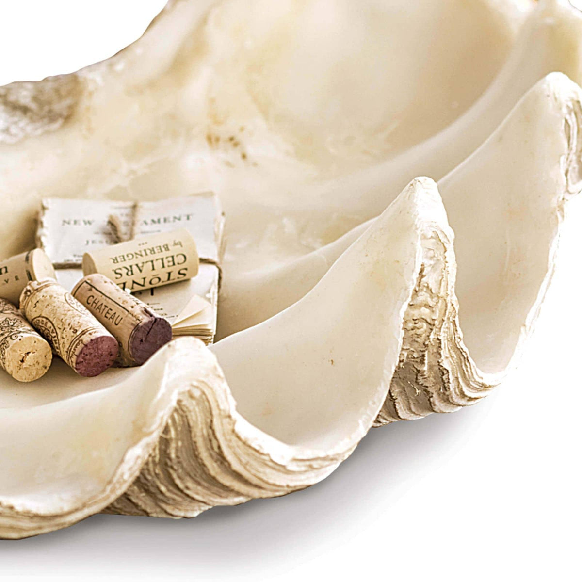 Large, off-white resin clam replica serving as a decorative bowl, showcasing detailed, naturalistic textures.