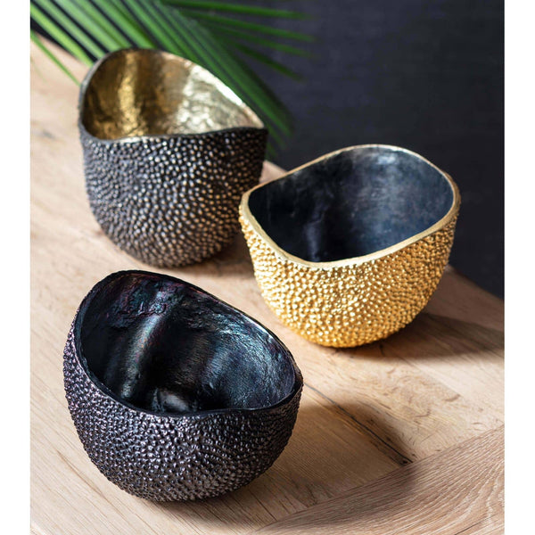 Three Jack bowls: two with textured patina exteriors and brass interiors, one with a textured brass exterior.