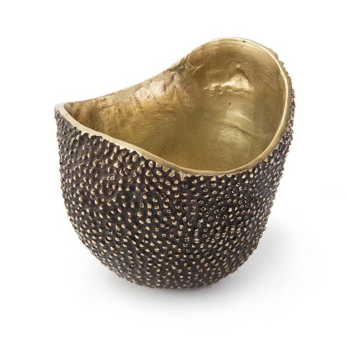 Jack Bowl Brass, a textured, dark patina exterior and shiny brass interior, inspired by jackfruit.