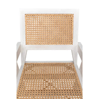 Jude Chair with white wash wood frame and natural caning on the backrest and seat.