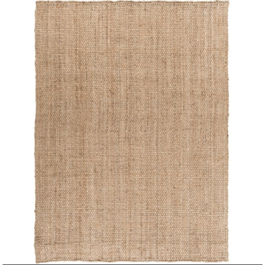 Tan hand-woven jute rug with a natural, textured weave.