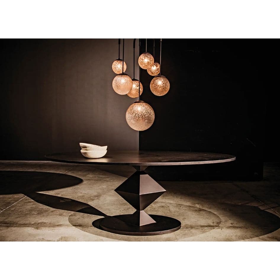 Katana oval dining table with black metal geometric base and matte black top.