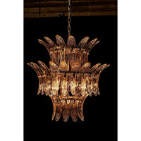 King 3-tier crystal chandelier with burnished brass frame and curved glass crystals.