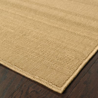 Lanai Beige outdoor rug with natural Sisal-inspired multiple weaves and textures on a dark wood floor.