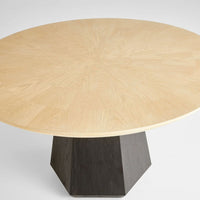 Liam 54" round dining table with natural oak sunburst top and black oak faceted hexagonal base.