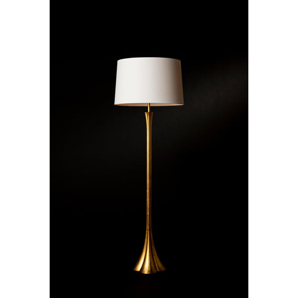 Lillian floor lamp with a sleek, modern brass silhouette and a natural linen shade.