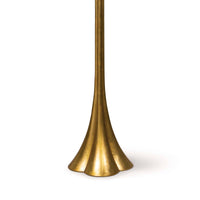 Lillian Floor Lamp base, featuring a sleek, modern, polished brass silhouette with a flared, scalloped design.