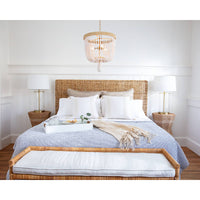 White Logia rectangle tray with rope handles on a bed with breakfast.