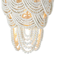 Lorelei white wood bead chandelier with cascading layers and a jute-wrapped frame.