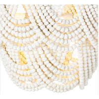 Lorelei 24" white wood bead flush mount light with cascading distressed beads and visible candelabra bulbs.