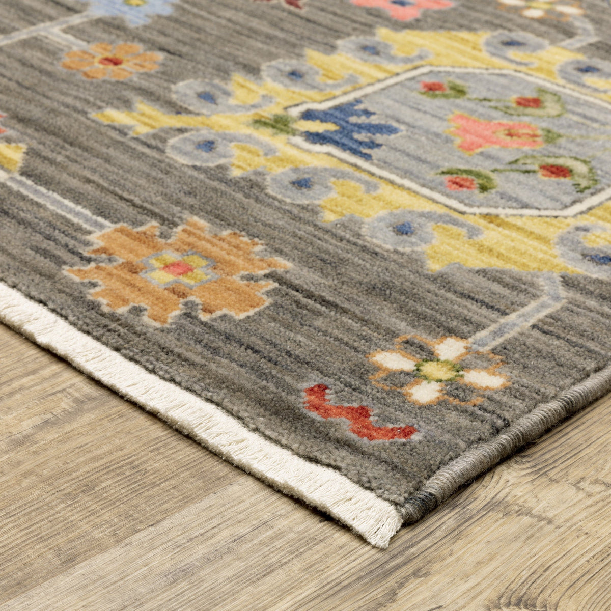Lucca Charcoal & Multi Traditional Rug with vibrant floral and geometric patterns, wool/nylon blend.