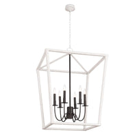 Large Luella lantern with textured white frame and elegant blackened brass candelabra lighting.