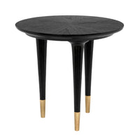 Round charcoal black sungkai wood side table with brass cap legs, modern and timeless design.
