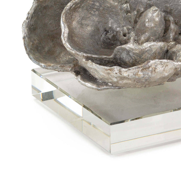 Silver leaf magnolia bloom objet on a clear crystal base, 5" tall.