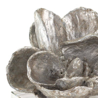 Silver leaf magnolia bloom sculpture on a clear crystal base, 5" tall, modern glam style.