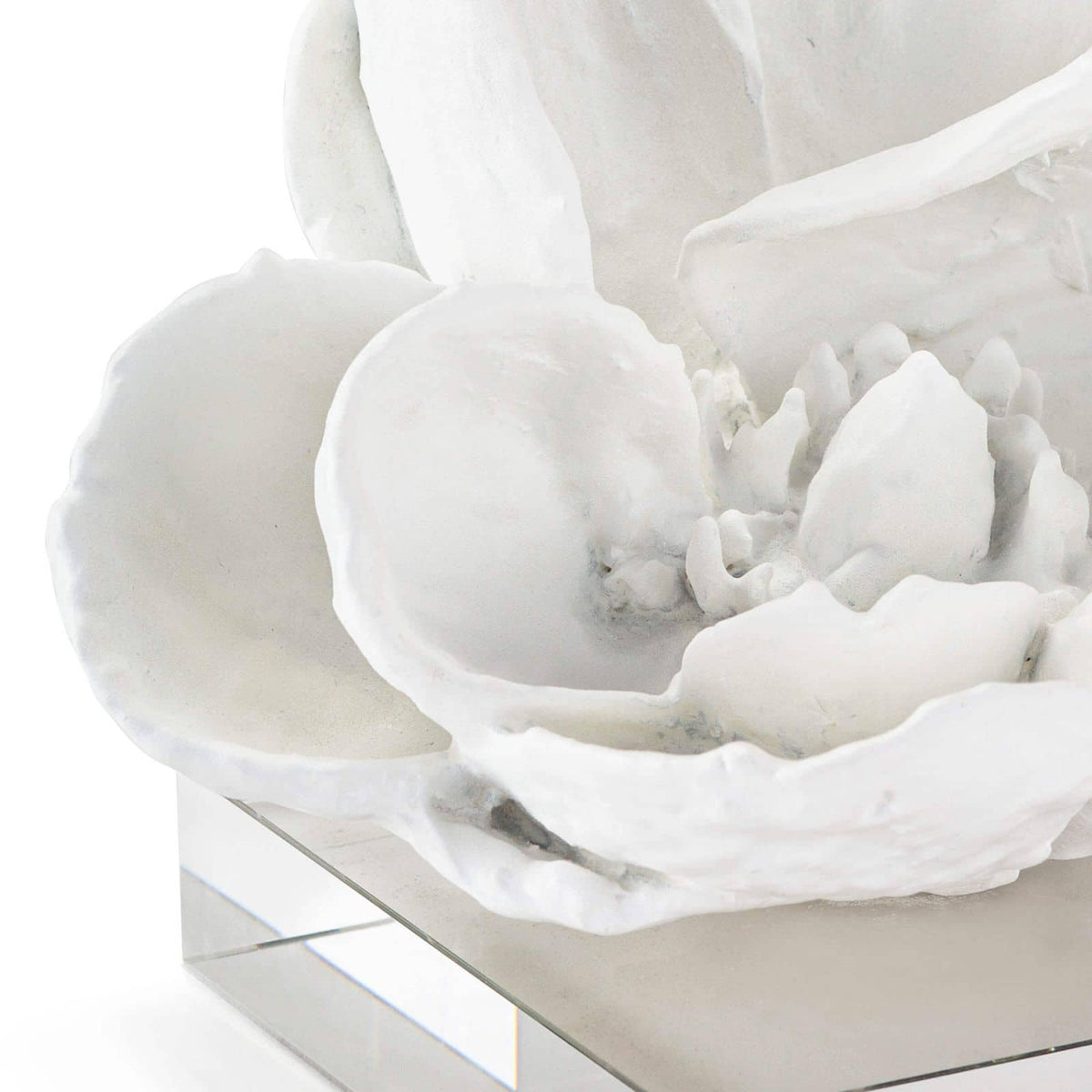 White magnolia bloom objet on a clear crystal base, 5" tall, modern glam style.