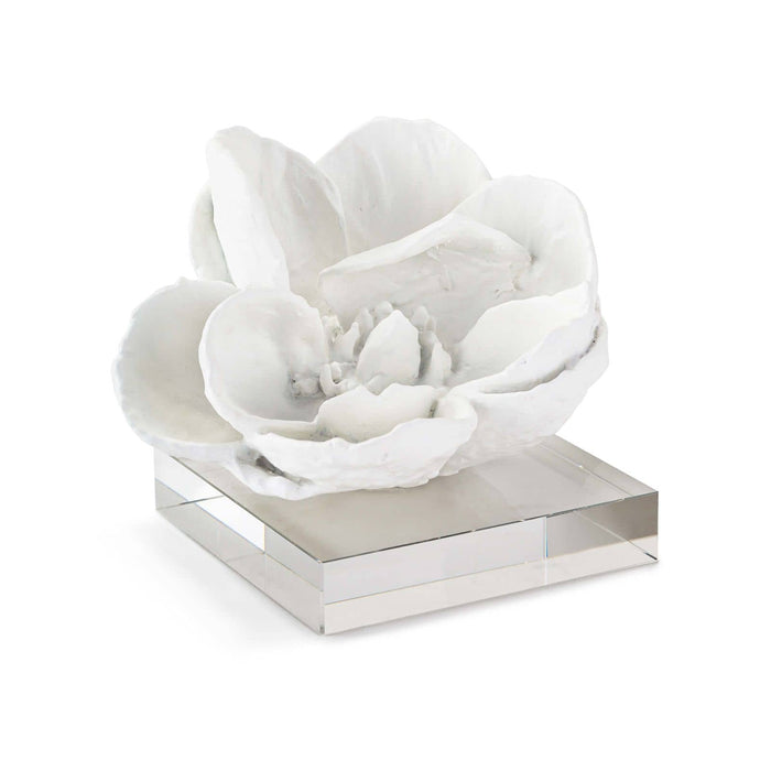 White magnolia bloom sculpture on a clear crystal base, 5" tall, modern glam style.