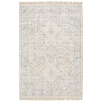 Hand-loomed Malabar Beige & Grey Casual Rug with subtle Persian designs and fringe.