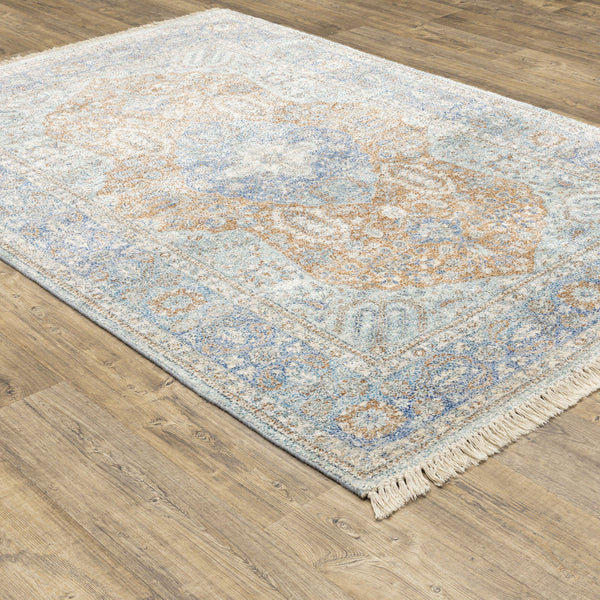 Hand-loomed Malabar blue & red traditional chenille rug with Persian design and fringe.